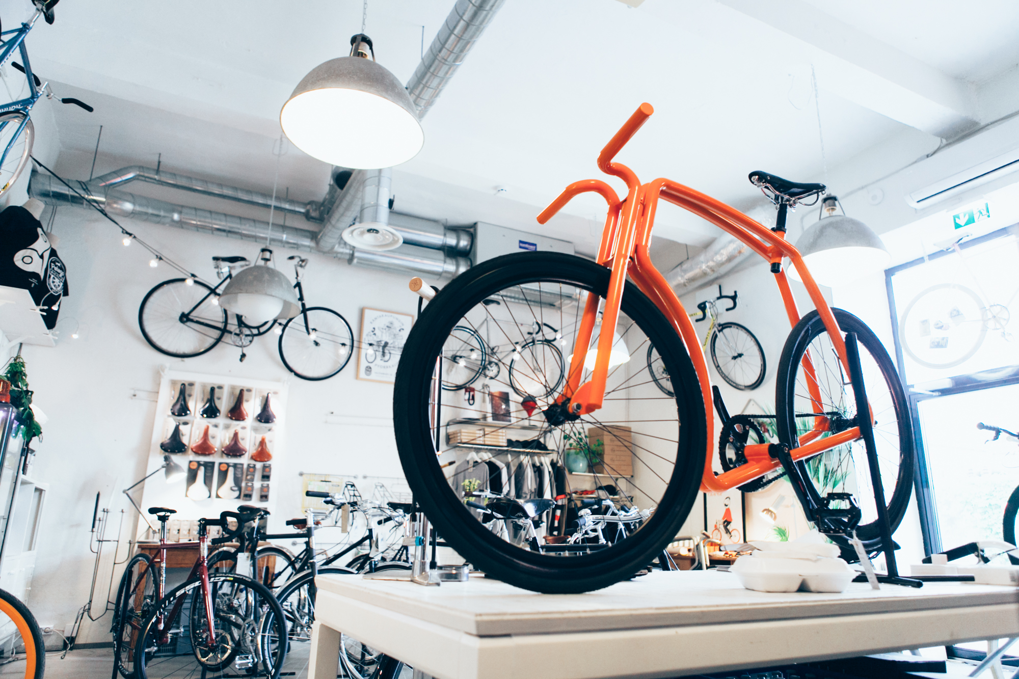 Jooks Bicycle Studio — orange bicycle on display