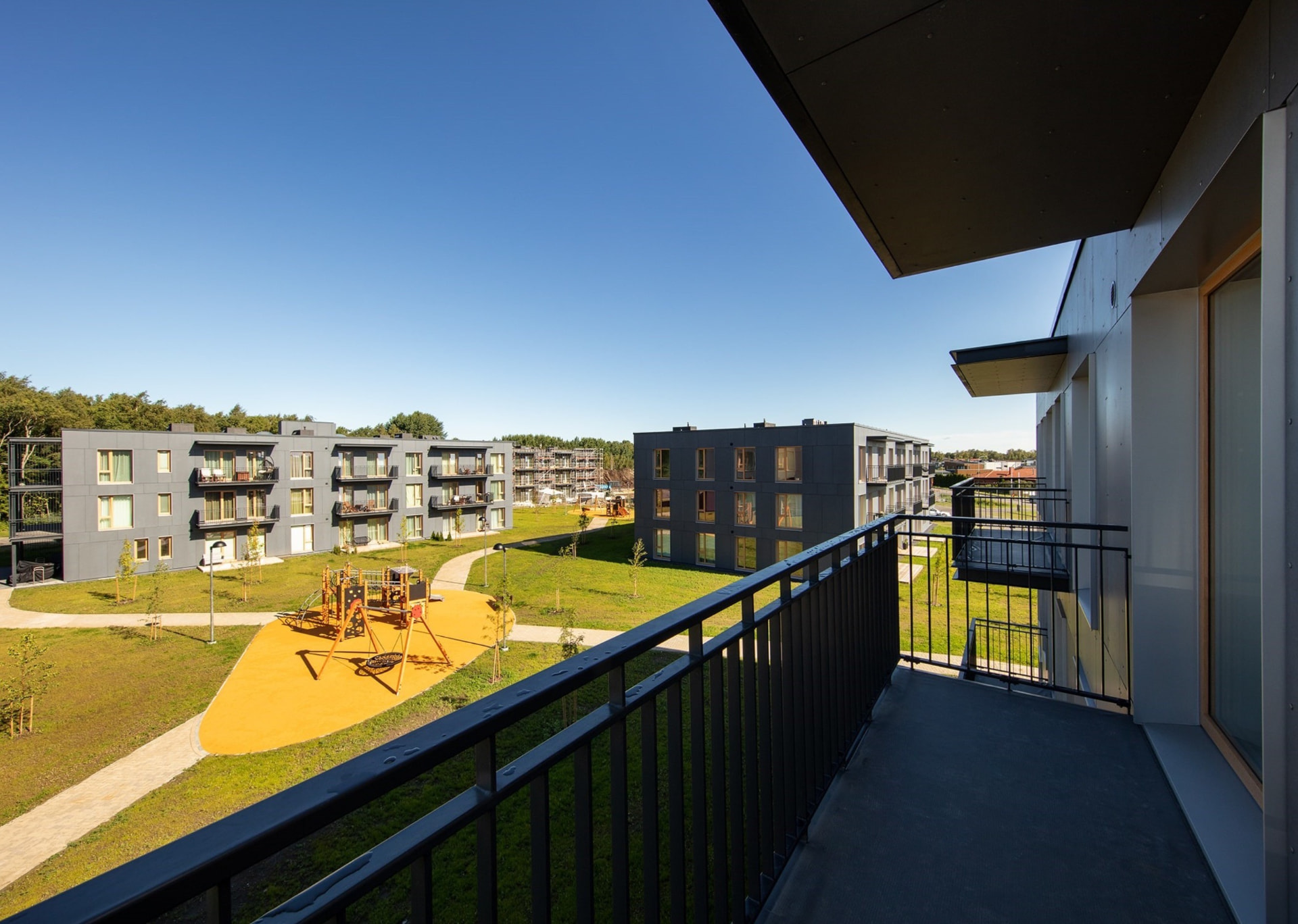 Kesk-Peetri — courtyard and playground seen from a balcony, photo by Triple Net Capital