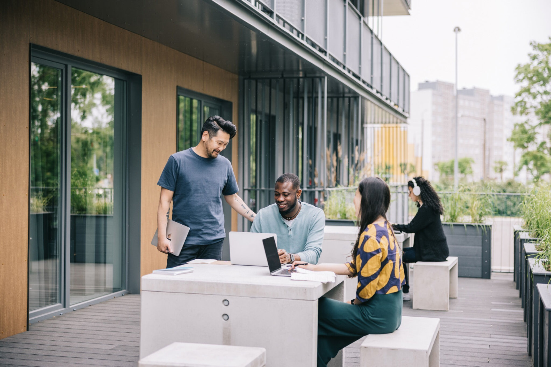 Rocca House — outdoor terrace and communal work area, photo by Larsen